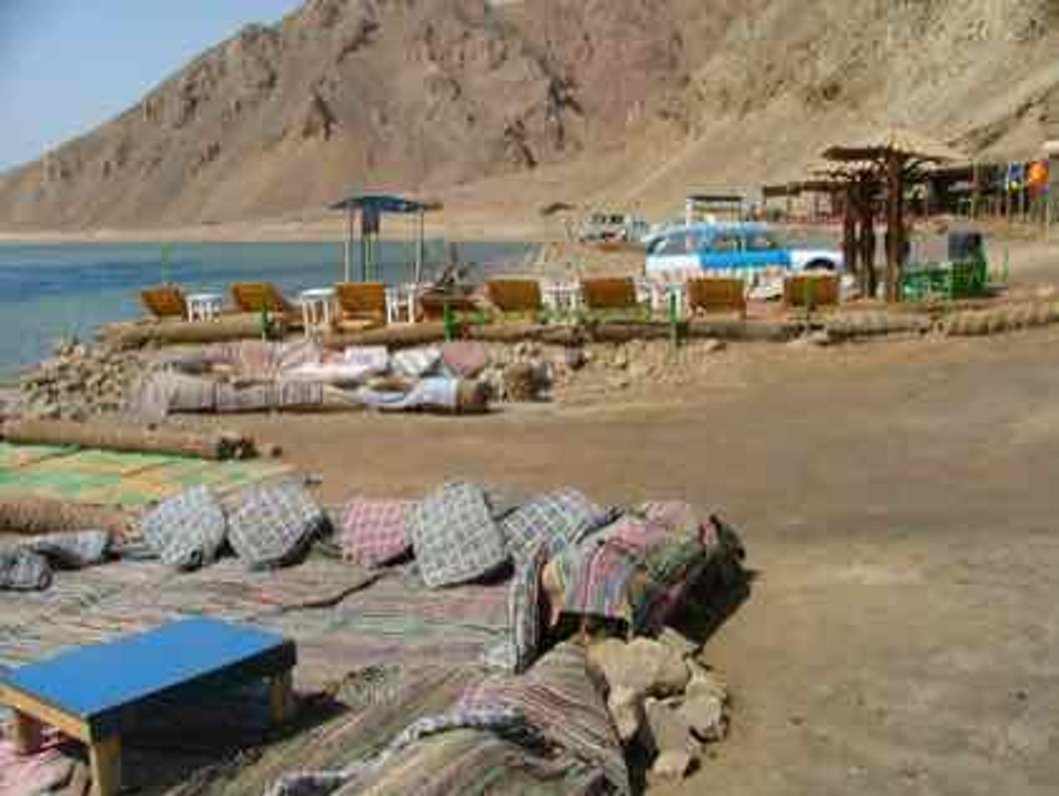 The deep blue circular sinkhole of the Blue Hole dive site at Dahab