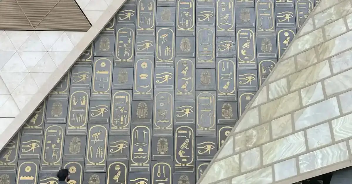 Grand Egyptian Museum facade hieroglyph cartouche panels