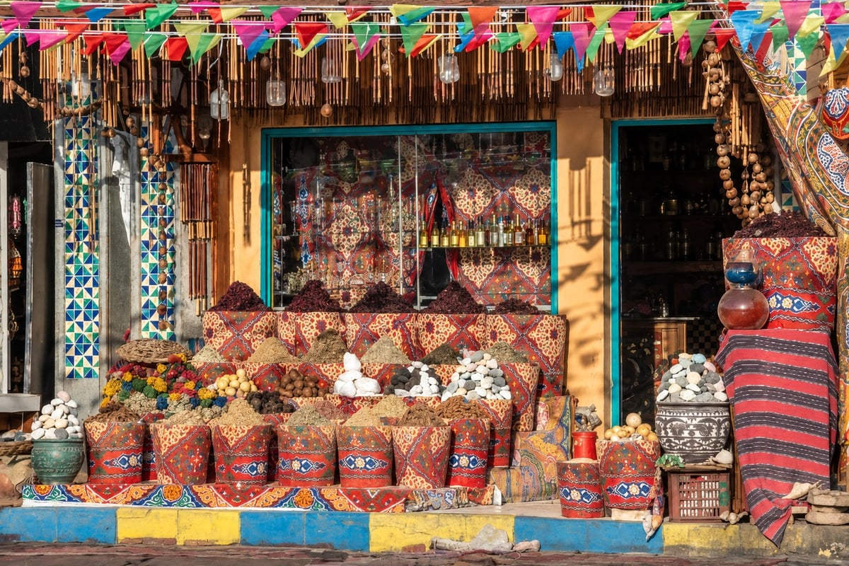 Colorful Sharm El Sheikh market stall with spices and textiles, Sharm El Sheikh Airport to hotel arrival transfer