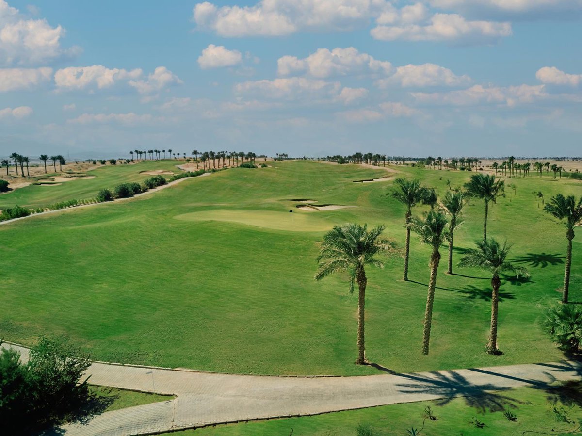 JAZ Makadina golf course with green fairways and palm trees.