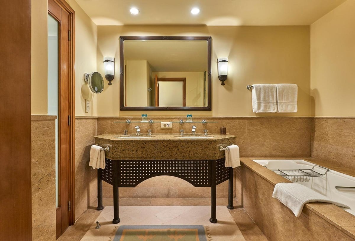 Four Seasons Resort Sharm El Sheikh bathroom with a double-sink vanity and a bathtub.