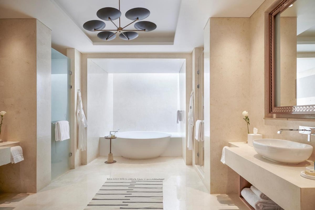 Four Seasons Resort Sharm El Sheikh bathroom with a freestanding tub and vessel sink.