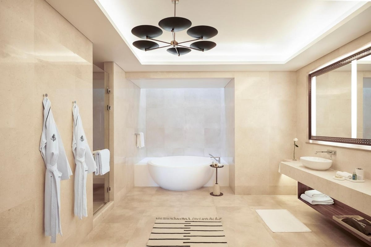 Four Seasons Resort Sharm El Sheikh bathroom with a freestanding bathtub and wide vanity.