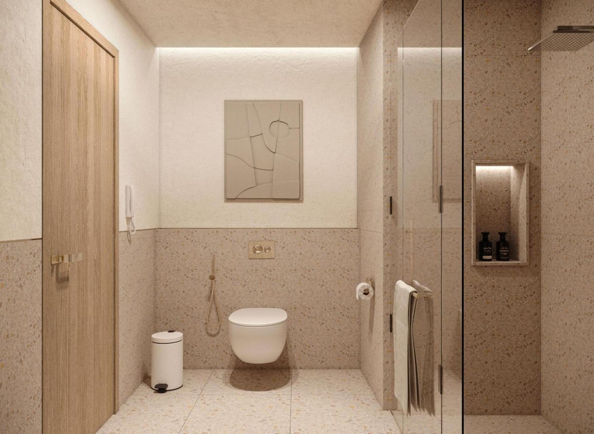 Baron Resort Sharm El Sheikh bathroom with a wall-mounted toilet and glass shower enclosure.