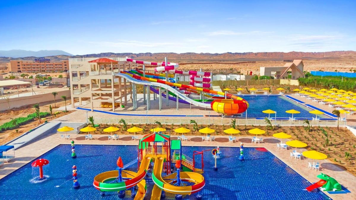 Pickalbatros Sea World Resort Marsa Alam water park with colorful slides and multiple pools.