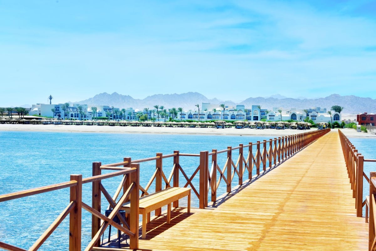 Steigenberger Alcazar pier with wooden decking and railings.