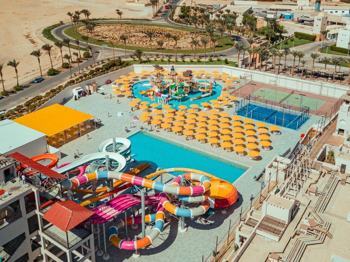 Pickalbatros Sands Port Ghalib water park with twisting slides and a splash pool.
