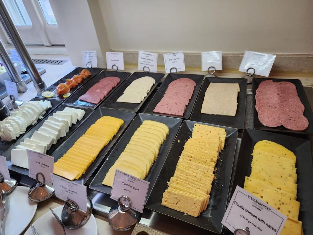 Steigenberger Cecil Hotel Alexandria buffet with sliced cheeses and cold cuts.