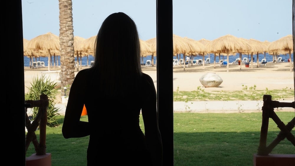 Amarina Jannah Resort & Aqua Park patio with a beach view and thatched umbrellas.