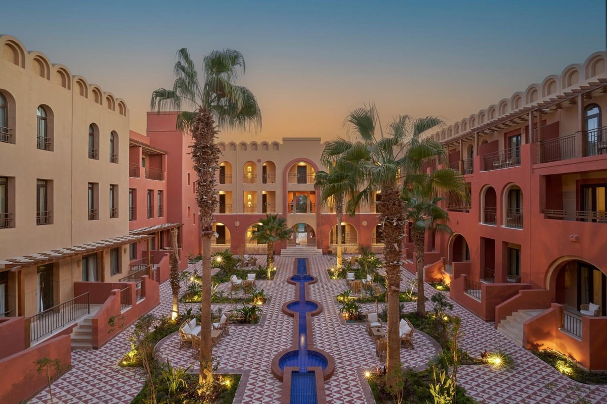 Three Corners Ocean View El Gouna (Adults Only) courtyard with a central fountain and patterned paving.
