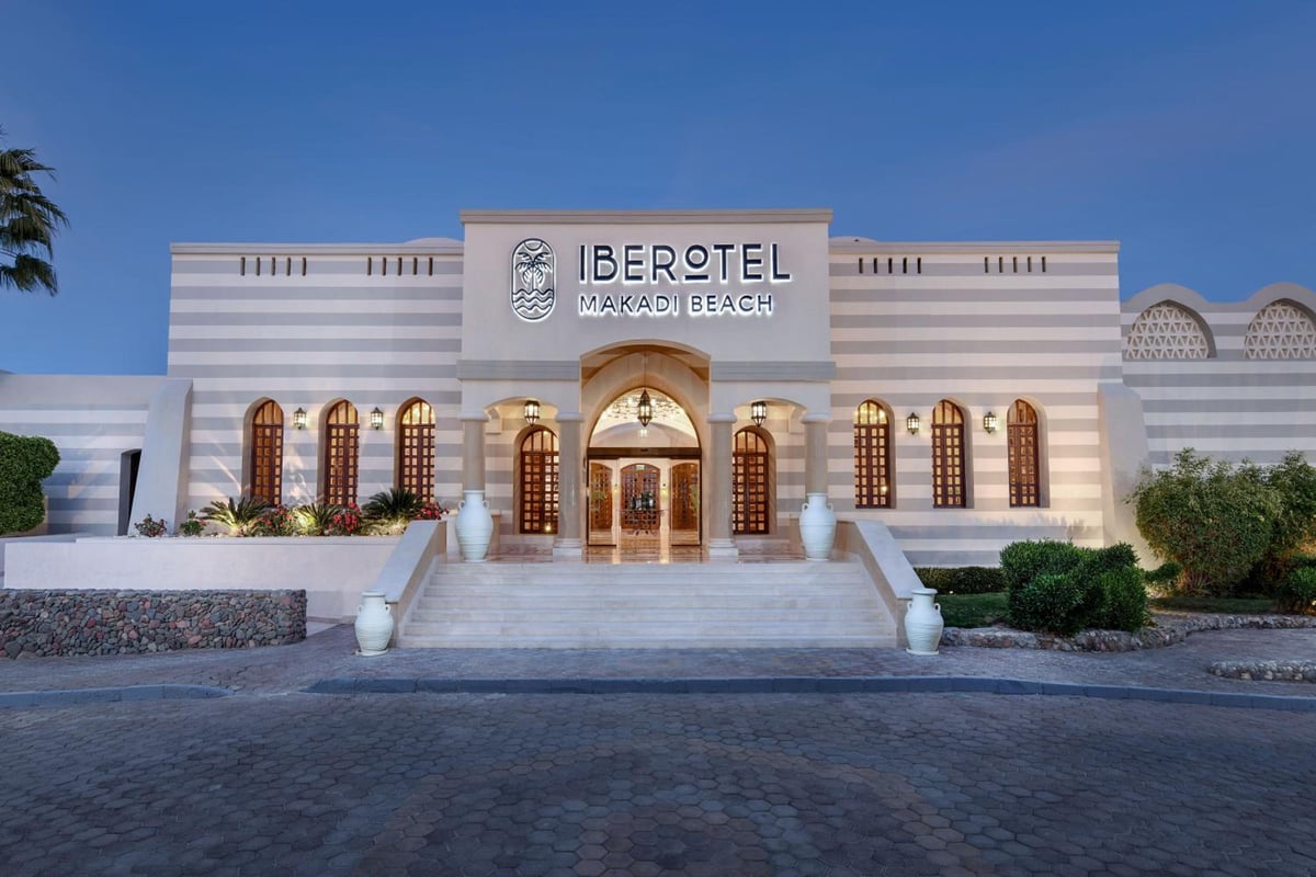 Iberotel Makadi Beach hotel entrance with an arched doorway and broad steps.