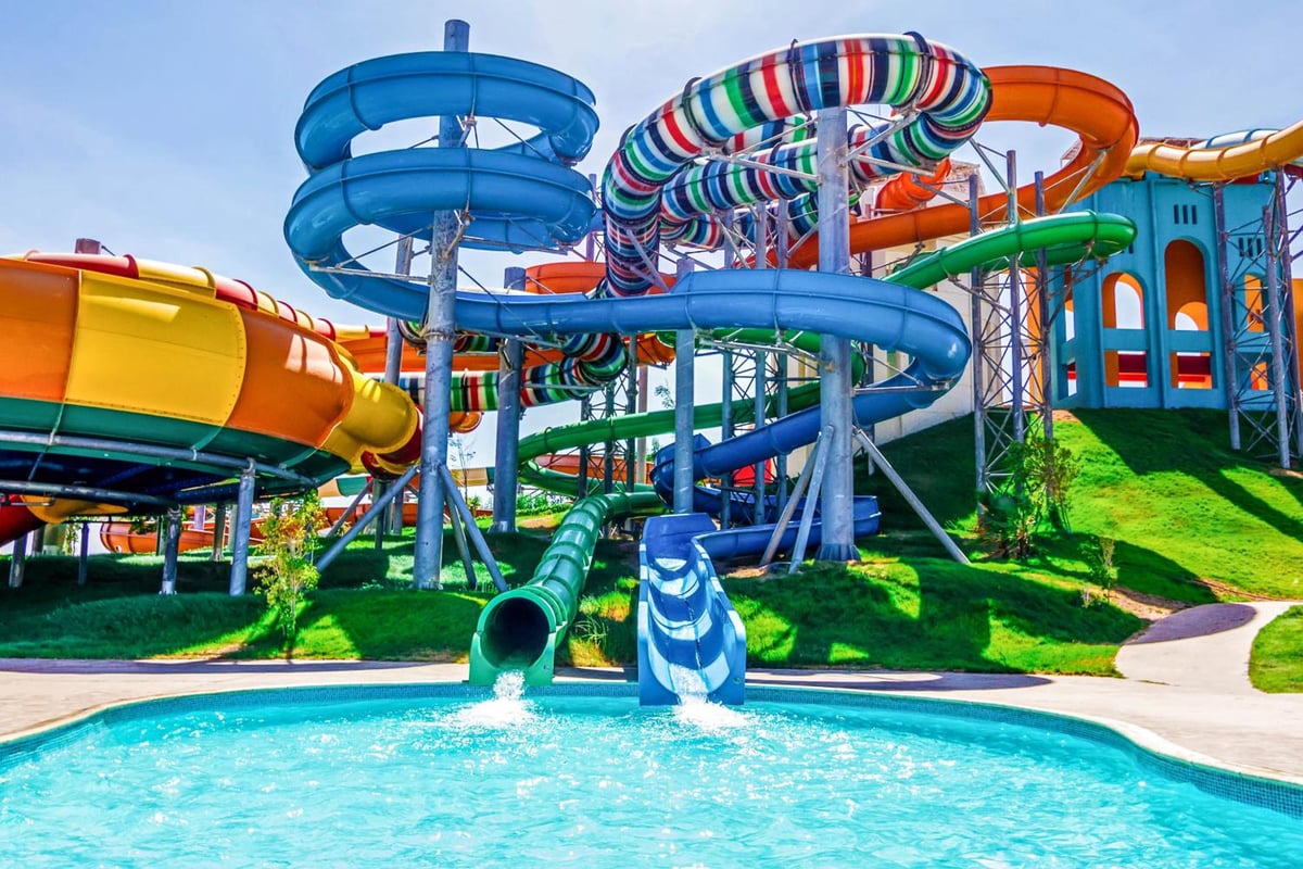 Iberotel Makadi Beach water park with colorful slides and a pool.