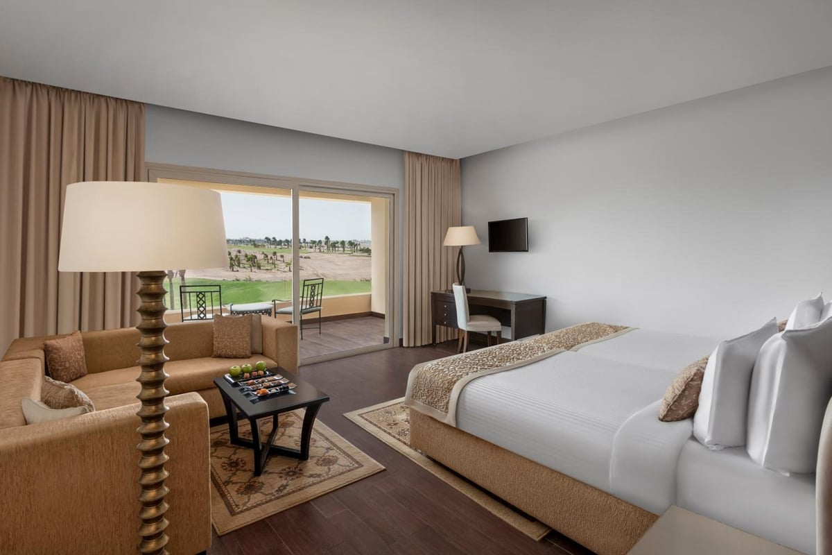 Steigenberger Makadi (Adults Friendly 16+) guest room with a bed and sitting area.