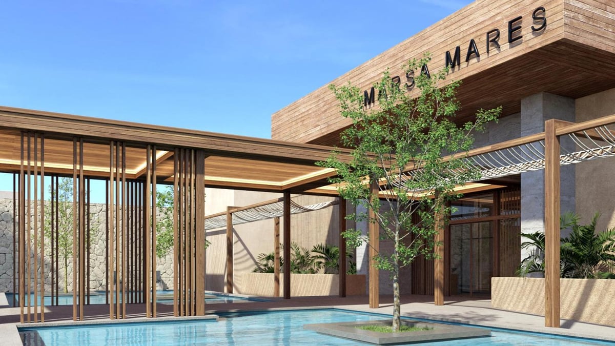 JAZ Elite Riviera entrance courtyard with a timber canopy and a shallow pool.