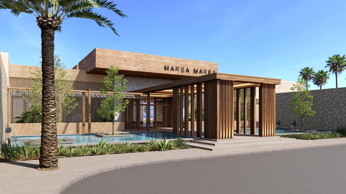 JAZ Elite Riviera hotel entrance with timber screens and a shallow reflecting pool.