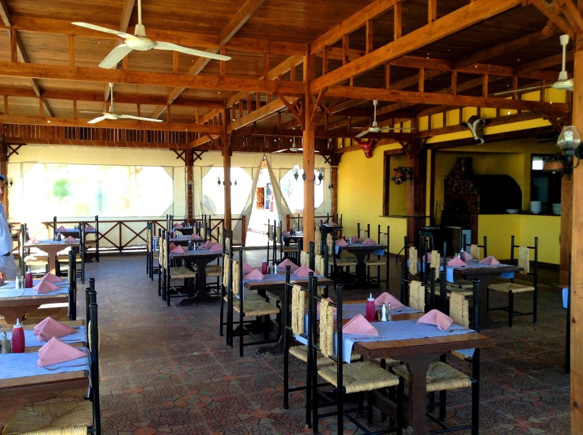Giftun Azur Resort dining area with a timber roof and open sides.