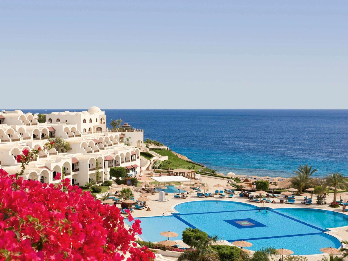 Movenpick Resort Sharm El Sheikh pool area with a geometric pool and sea views.