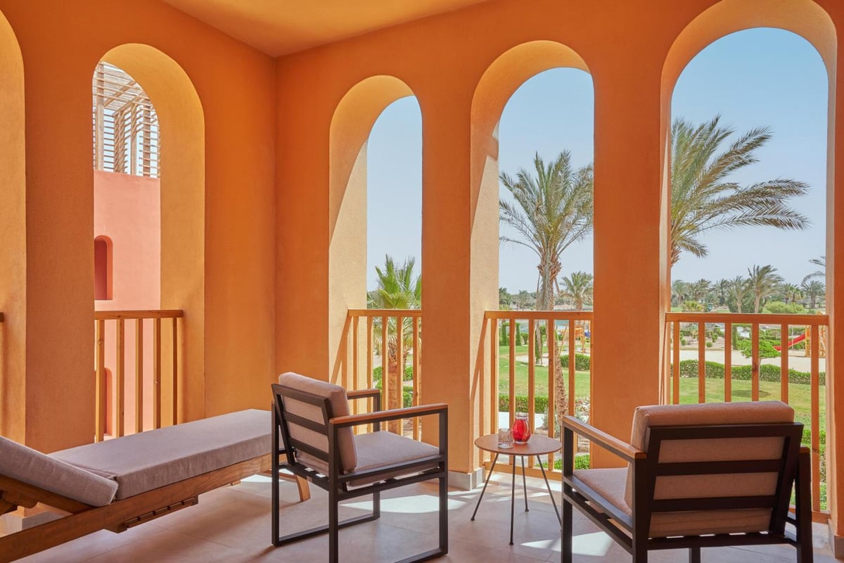 Steigenberger Golf Resort El Gouna terrace with arched openings and outdoor seating.