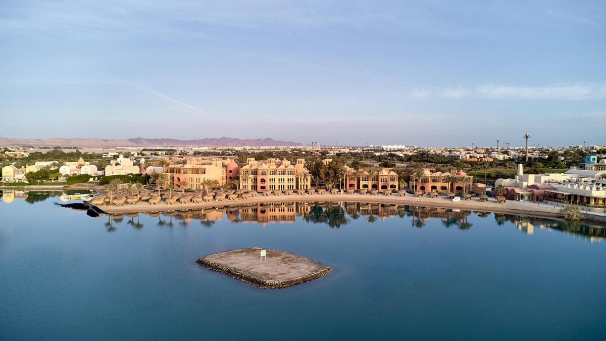 Steigenberger Golf Resort El Gouna lagoon with calm water and waterfront buildings.